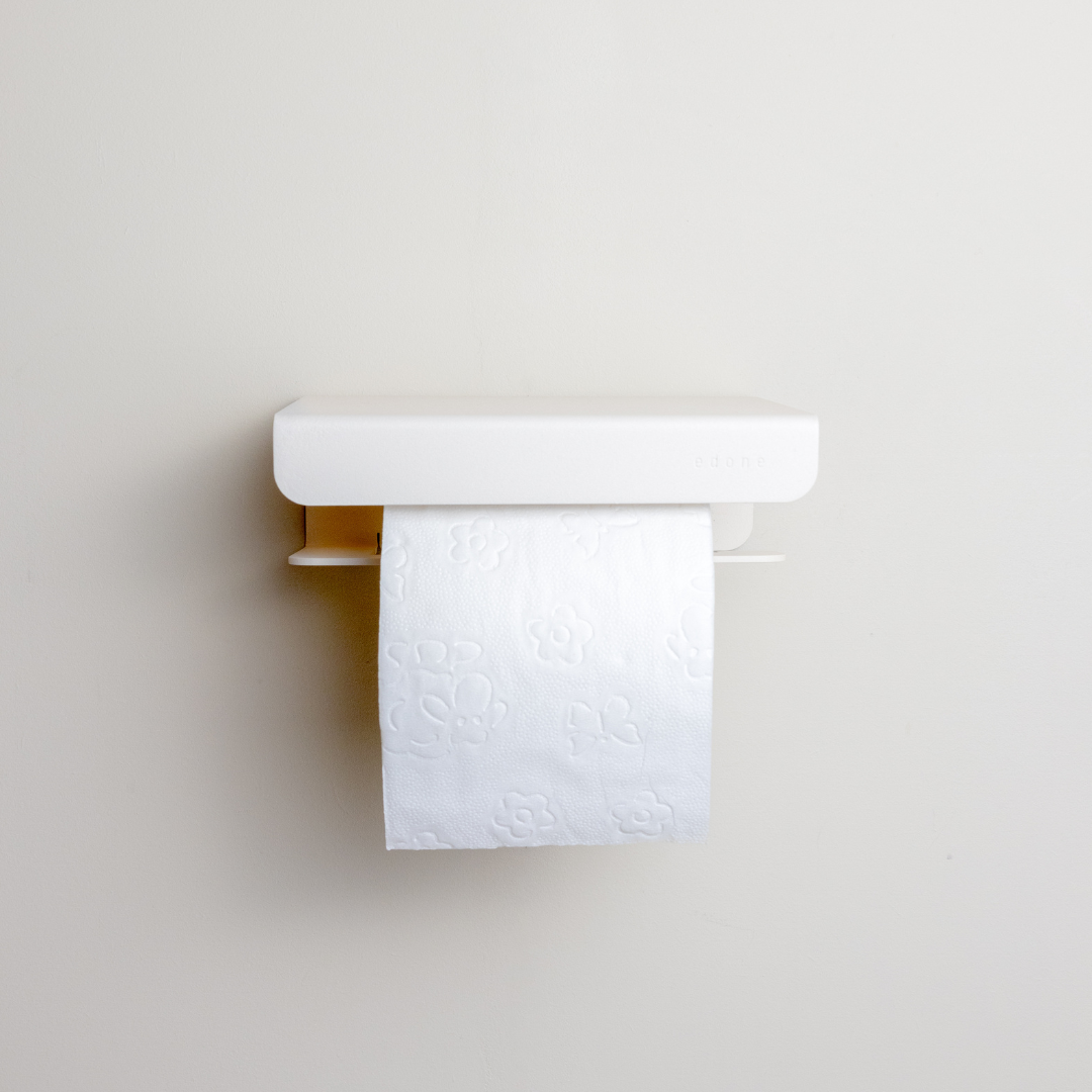 Le porte papier toilette avec tablette