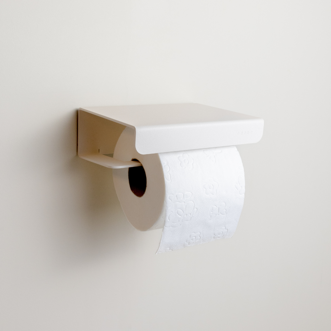 Le porte papier toilette avec tablette